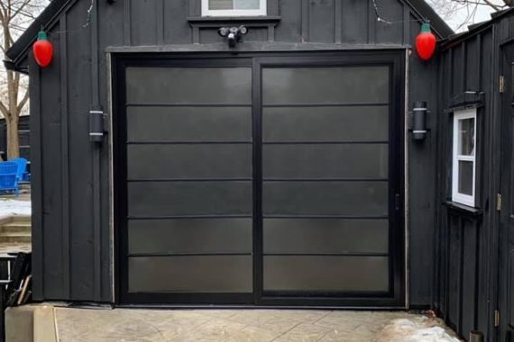 A black two-panel patio door in London, Ontario, custom manufactured by North Star Windows & Doors.