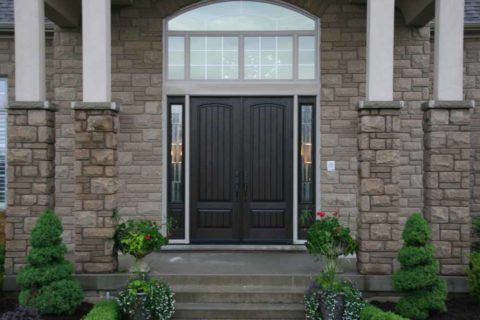 A black, fiberglass double door with sidelites and