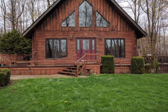 A log home renovation by London, Ontario's Heritage Renovations in partnership with North Star Windows & Doors and Gentek.