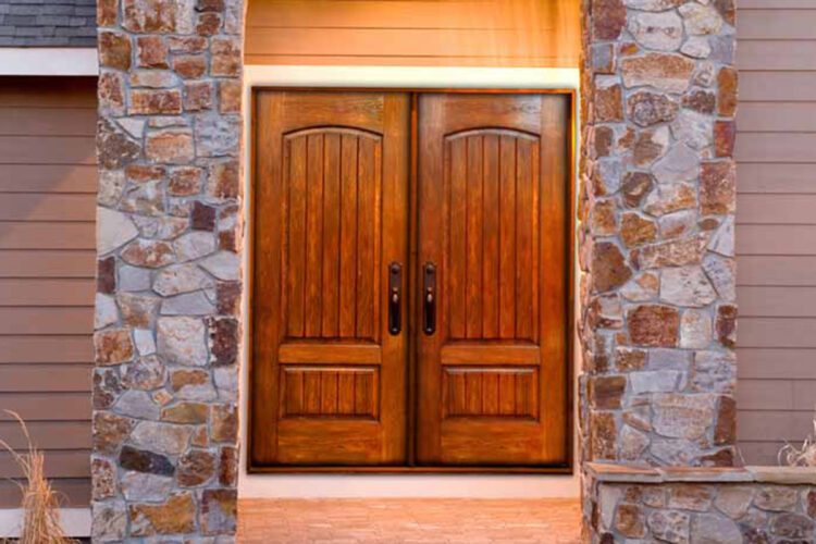A golden oak-stained fiberglass double door from Heritage Renovations.