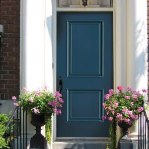 A blue London steel door with Prestige Mouldings from Gentek-Novatech and Heritage Renovations Windows & Doors.